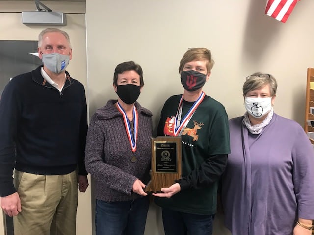 Dr. Todd Bess, Director of IASP, delivered a plaque to Bibich's Spell Bowl coaches (Miss Snow and Miss O'Rourke) for the team's 1st place finish.